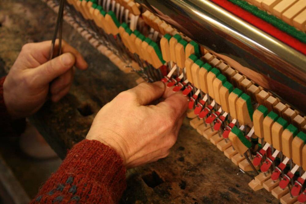 Riparazione pianoforte Verticale