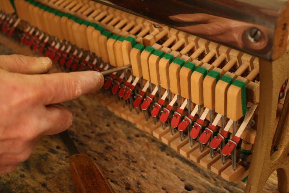 Riparazione pianoforte Verticale