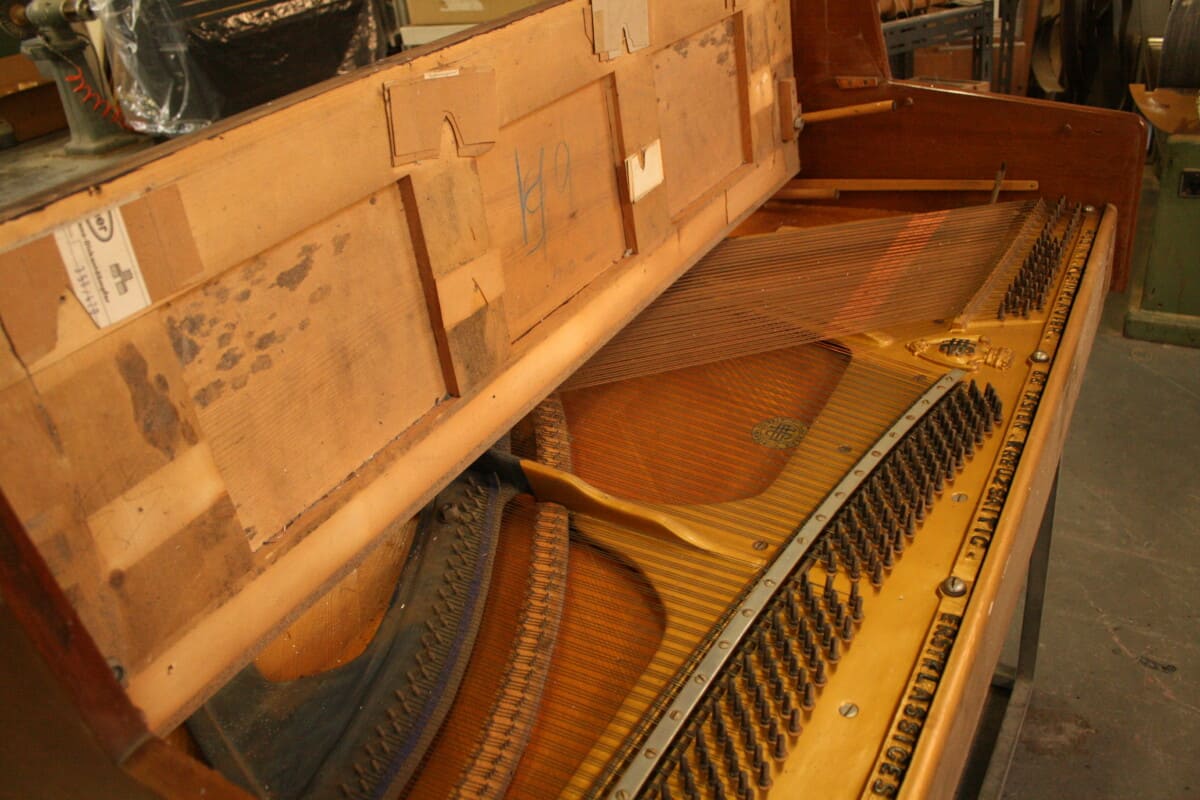 Riparazione pianoforte Verticale